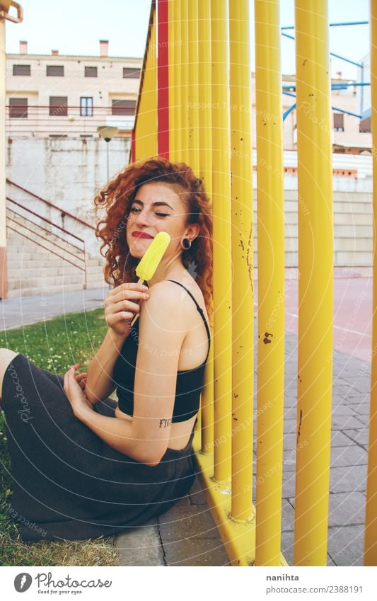Young happy woman with a lemon ice pop Food Ice cream Lifestyle Style Joy Wellness Summer Summer vacation Human being Feminine Young woman Youth (Young adults)