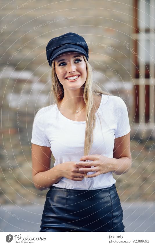 Young blonde woman smiling near a brick wall Lifestyle Style Happy Beautiful Hair and hairstyles Summer Human being Feminine Young woman Youth (Young adults)