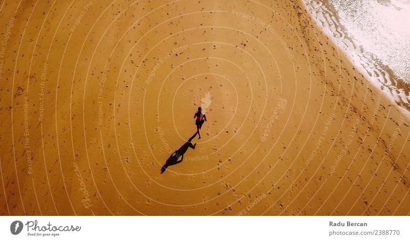 Aerial View Of Sportive Woman Running On Beach Athletic Fitness Adventure Summer Ocean Sports Sports Training Sportsperson Jogging Human being Feminine