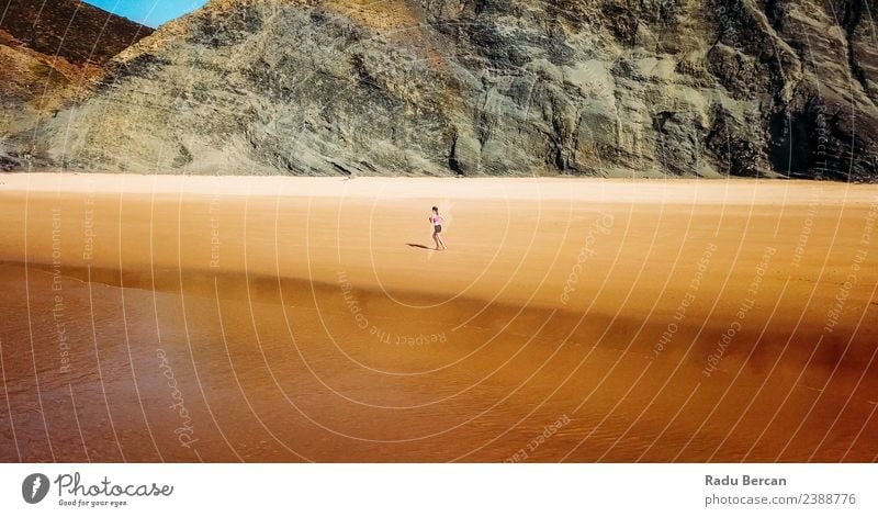 Aerial View Of Sportive Woman Running On Beach Adventure Freedom Summer Ocean Island Mountain Sports Sportsperson Jogging Human being Young woman