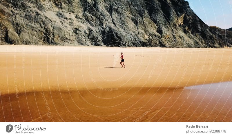 Aerial View Of Sportive Woman Running On Beach Adventure Freedom Summer Ocean Island Sports Track and Field Sportsperson Jogging Human being Young woman