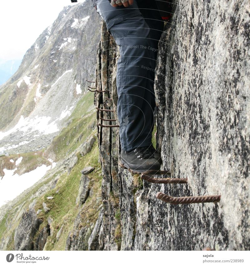 on challenging because of Adults Legs Feet 1 Human being Environment Nature Landscape Rock Alps Mountain Wall of rock Lanes & trails via ferrata Iron rod