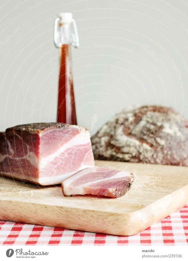 Bacon & Schnaps Food Meat Nutrition Beverage Alcoholic drinks Spirits Delicious Unhealthy Ham Slice of ham Bread Wooden board Rustic Fat Bottle Colour photo