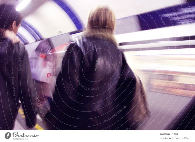 London Underground 1 Mobility In transit Backpack Woman Speed Driving Transport Human being Railroad Backwards Blur