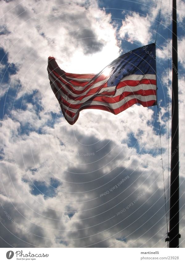 Stars and Stripes Flag Clouds USA Sky American Flag Flags at half mast Back-light Sunlight X-rayed Wind Blow Clouds in the sky