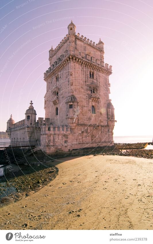 Tower of Bethlehem Sand Sky Beautiful weather Coast Lisbon Portugal Capital city Port City Old town Deserted Tourist Attraction Landmark Tower of Belem Stone