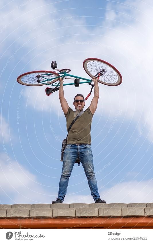 Urban man holding his bike wearing sunglasses Lifestyle Style Happy Leisure and hobbies Human being Masculine Young man Youth (Young adults) Man Adults