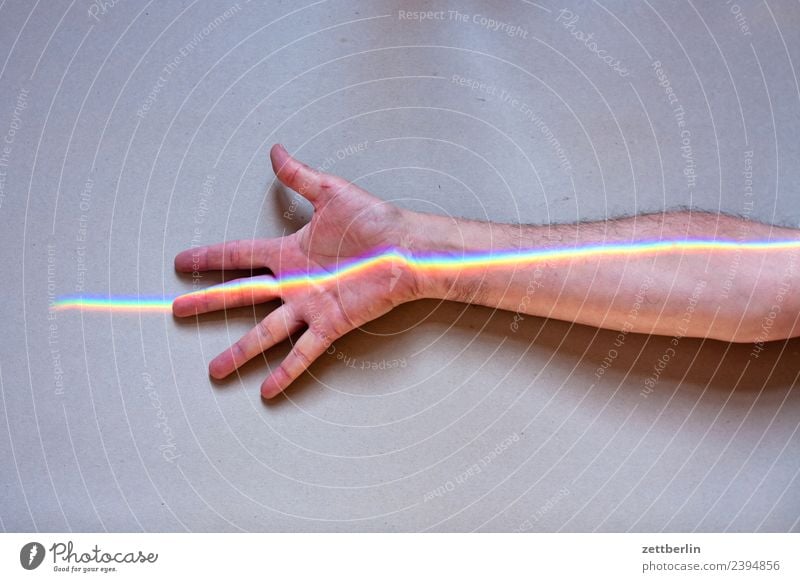 Finger with coloured light (5) Arm Multicoloured Colour Fingers Hand Palm of the hand Lie inboard Light Refraction Beam of light Man Human being Physics Prism