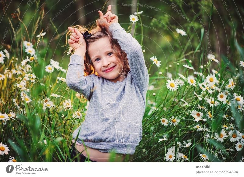 happy kid girl having fun Joy Beautiful Face Playing Vacation & Travel Summer Sun Child Woman Adults Infancy Nature Weather Warmth Flower Grass Forest Smiling