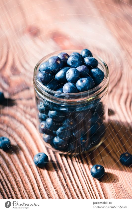 Freshly gathered blueberries put into jar Fruit Nutrition Vegetarian diet Bowl Summer Table Nature Wood Delicious Natural Juicy Blue Berries Blueberry Crops