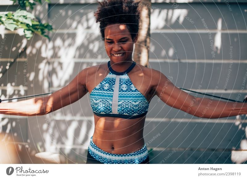 Young Melanesian woman doing exercise Lifestyle Athletic Fitness Leisure and hobbies Sports Sports Training Track and Field Masculine Feminine Young woman