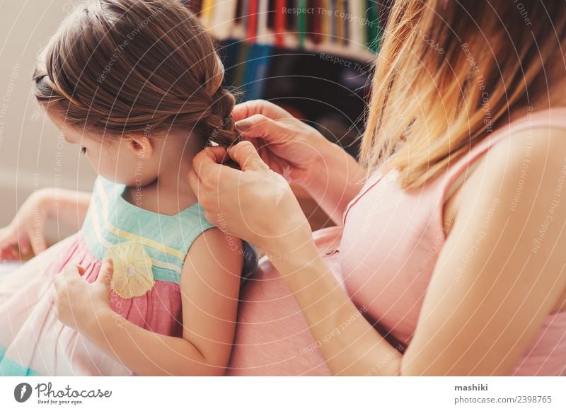 mother brushing toddler daughter's hair Lifestyle Happy Beautiful Playing Baby Toddler Woman Adults Parents Mother Family & Relations Flower Hairbrush Love Sit