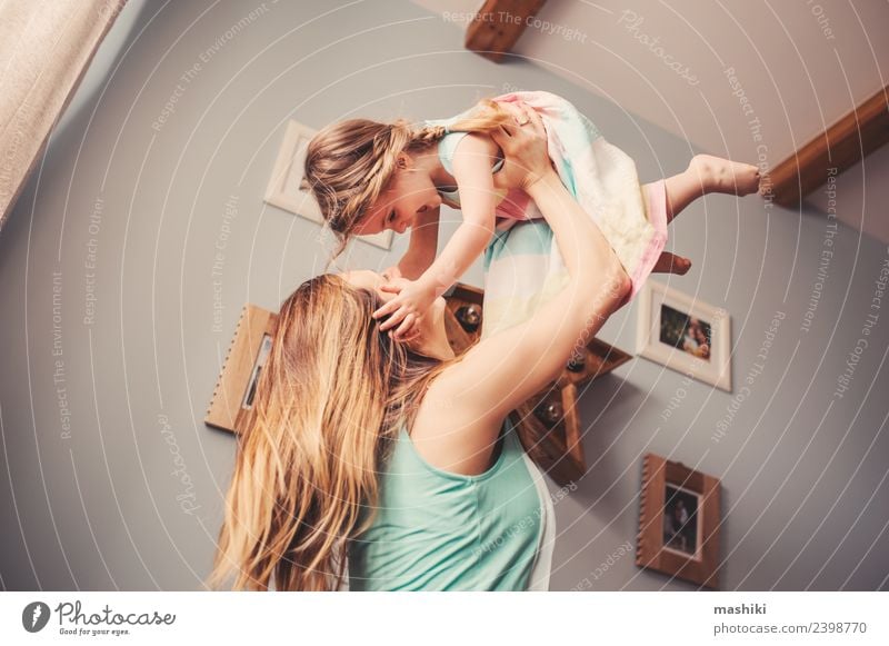 mother and toddler girl playing at home Lifestyle Sofa Modern interior room Toddler Playing Mother Home Happy Family & Relations Morning