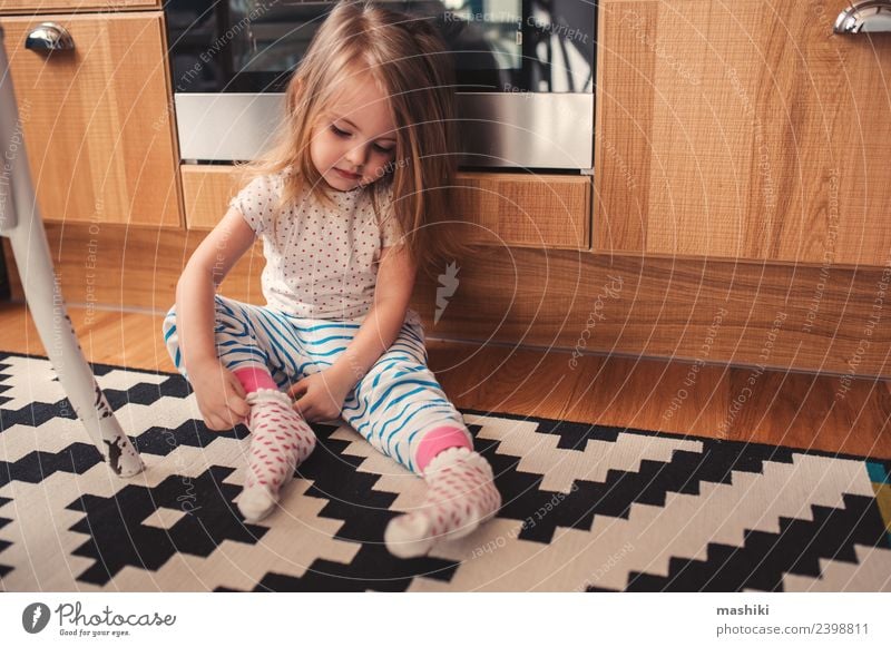 happy toddler girl in pyjamas Breakfast Lifestyle Joy Happy Beautiful Playing Kitchen Child Baby Woman Adults Infancy Clothing Sit Happiness Small Modern Cute