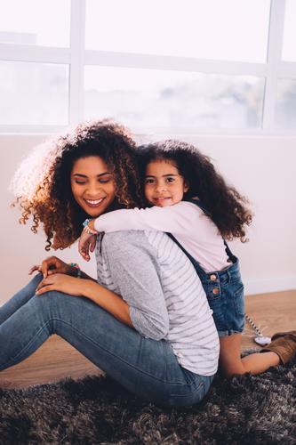 african daughter hugging her mom at home Happy Beautiful Life House (Residential Structure) Child Woman Adults Parents Mother Family & Relations Infancy Smiling