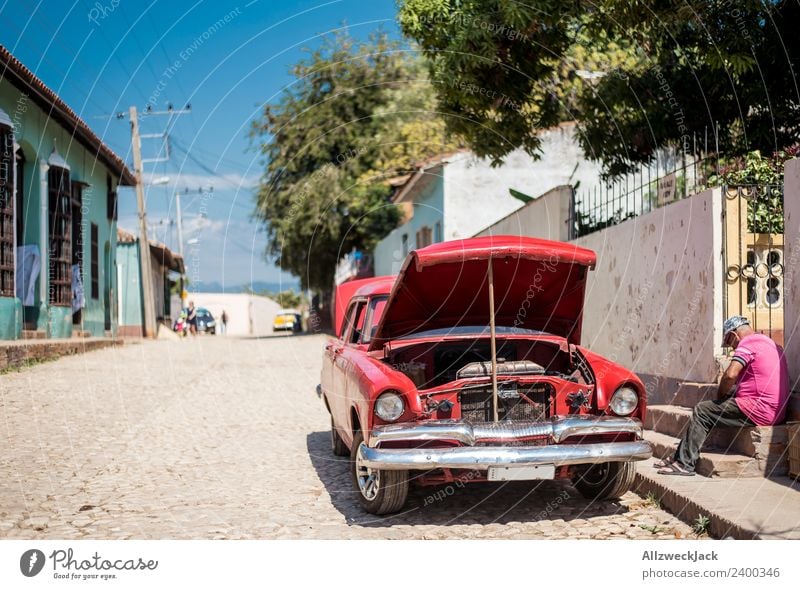 Man repairs his oldtimer at the roadside Cuba Trinidade Patriotism Socialism Vacation & Travel Travel photography Wanderlust Vintage car 1 Person Sit Blue sky