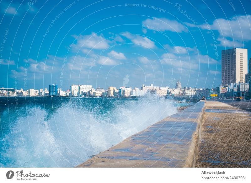 Skyline and spray at the Malecon in Havana Day Summer Blue sky Cuba El Malecón Ocean Water Waves White crest Promenade Coast House (Residential Structure)