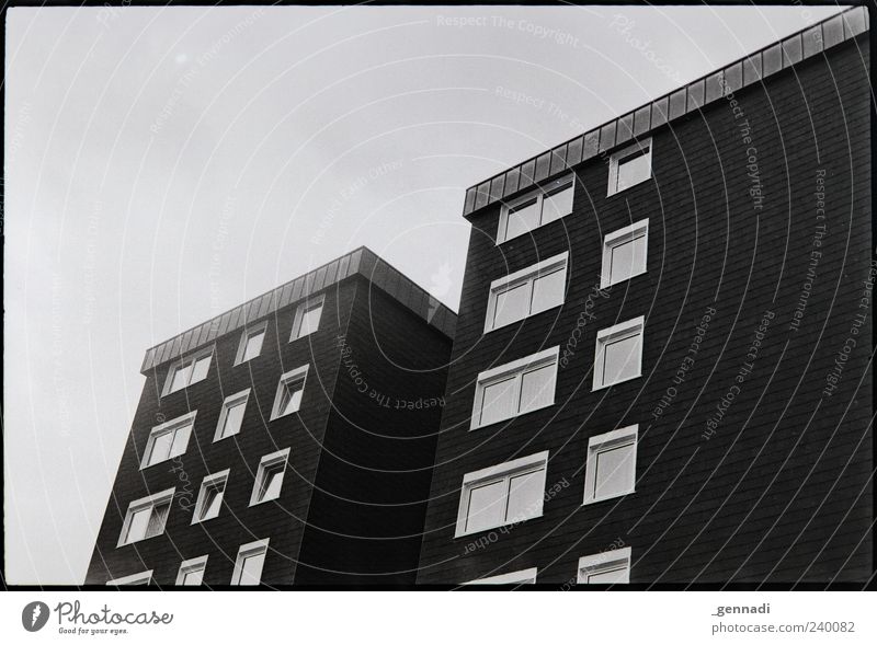 SLANTED House (Residential Structure) High-rise Old Gloomy Symmetry Analog Window Tumble down Black & white photo Exterior shot Copy Space left