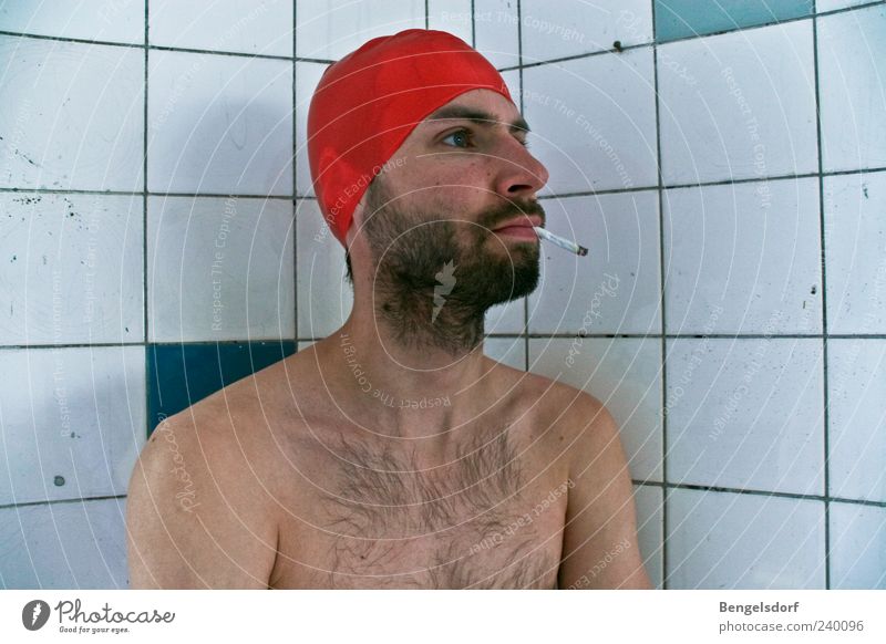 pool boy Human being Young man Youth (Young adults) Skin Chest 1 Bathing cap Facial hair Beard Hairy chest Smoking Wait Red Tile Addiction Nicotine Cigarette
