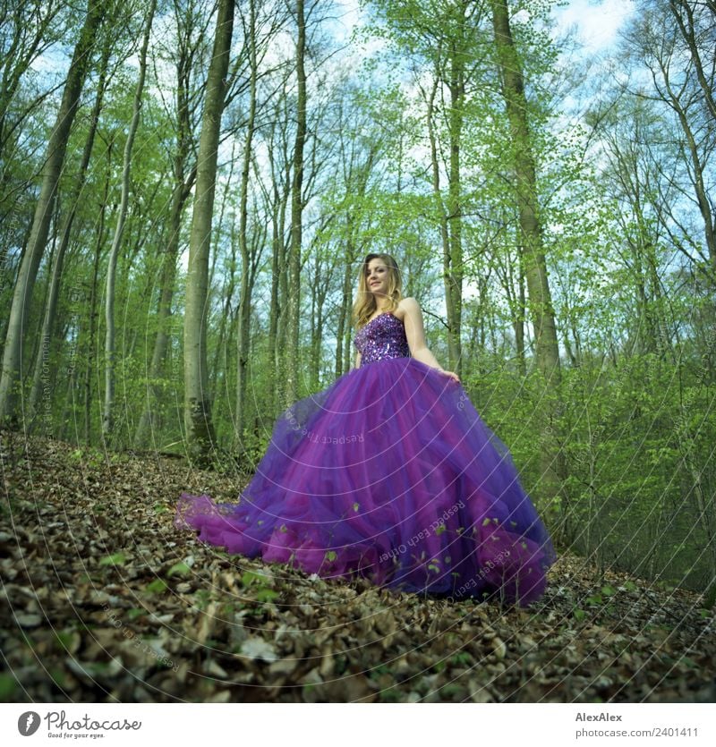 Young tall woman in purple/purple wedding dress in forest - analog portrait Lifestyle Shopping Luxury Elegant Style Well-being Trip Young woman