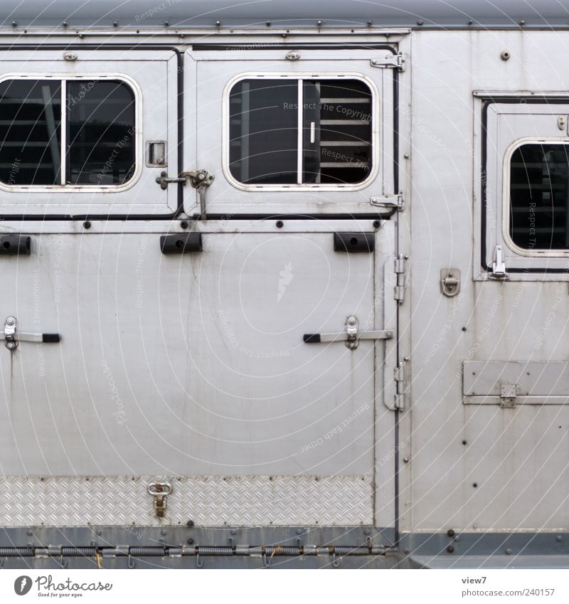 prison Transport Means of transport Vehicle Truck Trailer Metal Old Authentic Exceptional Simple Large Gray Colour photo Exterior shot Structures and shapes