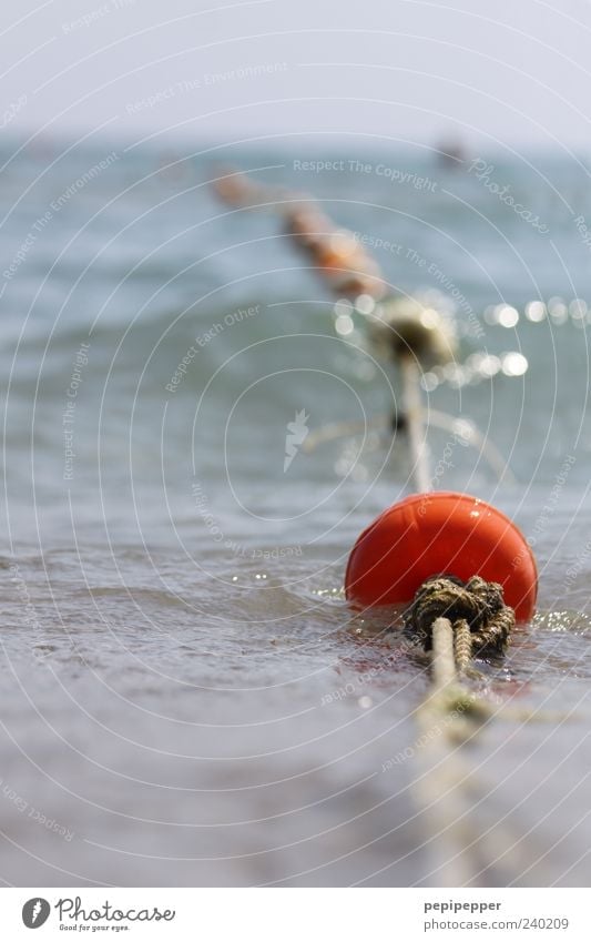 not good for your eyes Vacation & Travel Tourism Summer Ocean Waves Water Sky Beautiful weather Sphere Knot Blue Red Colour photo Exterior shot Close-up Detail
