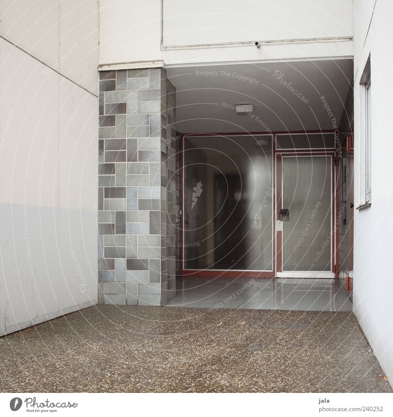 emergency exit House (Residential Structure) Manmade structures Building Architecture Wall (barrier) Wall (building) Facade Window Door Gloomy Gray Colour photo
