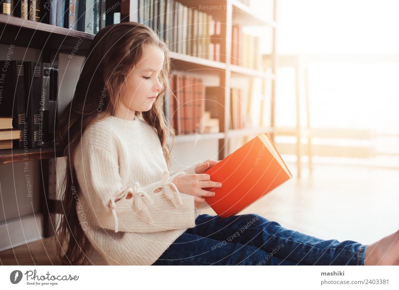 happy smart schoolgirl reading books Reading Child School Classroom Schoolchild Infancy Book Library Small Smart Concentrate Creativity kid learn education