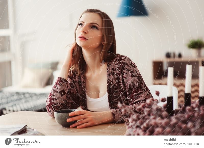 young beautiful woman relaxing at home Breakfast Coffee Tea Lifestyle Relaxation Flat (apartment) Table Kitchen Woman Adults Dream Hot Natural Loneliness