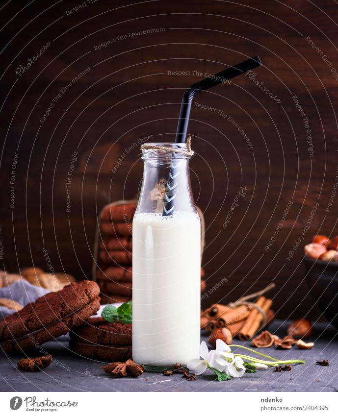 glass bottle with milk Breakfast Beverage Cold drink Milk Bottle Table Fresh Natural Retro Brown White background biscuits chocolate sweet Baking Rustic full