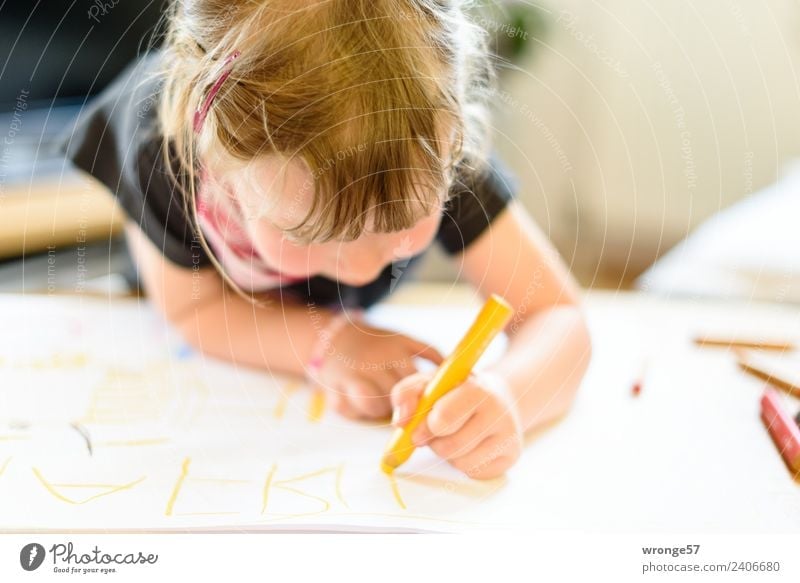 Girl writing with a yellow pencil Writing Write Draw Human being Feminine Child Toddler Infancy 1 3 - 8 years Paper Pen Near naturally Multicoloured Education