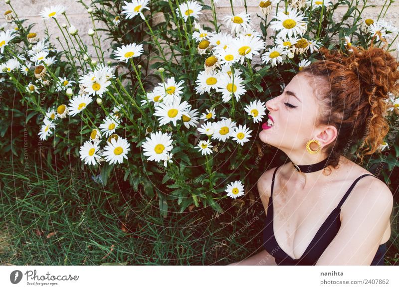 Young woman angry in a garden of daisies Lifestyle Style Design Beautiful Leisure and hobbies Human being Feminine Youth (Young adults) 1 18 - 30 years Adults