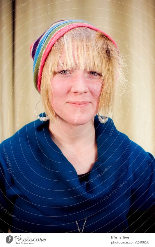 arbitrary_0 Feminine Young woman Youth (Young adults) Hair and hairstyles Face Sweater Cap Blonde Bangs Smiling Illuminate Authentic Brash Friendliness