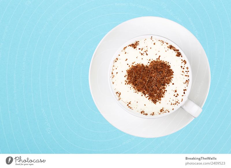 Close up cup of cappuccino over blue background Breakfast Beverage Hot drink Hot Chocolate Coffee Latte macchiato Mug Heart Blue White Joy Colour Saucer