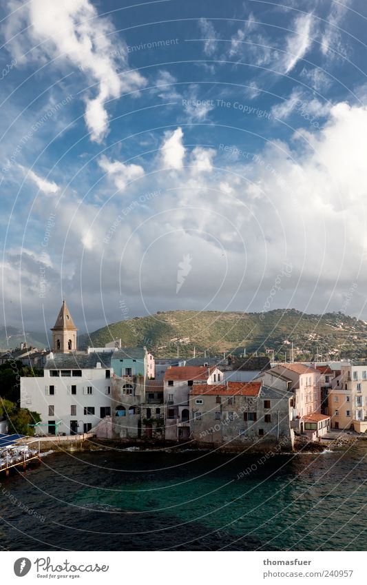 small town under big sky - Corsica Vacation & Travel Ocean Island Mountain Elements Air Water Sky Clouds Sunlight Summer Hill Fishing village Port City Old town
