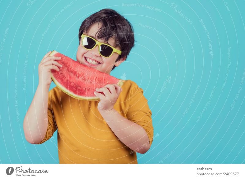 Happy child with sunglasses eats watermelon Food Fruit Nutrition Eating Organic produce Lifestyle Joy Wellness Human being Masculine Child Toddler Boy (child)