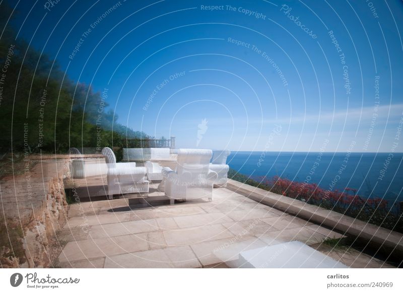Was it the sun or the wine? Water Sunlight Summer Beautiful weather Ocean Blue Brown White Horizon Perspective Surrealism Armchair Terrace Stone slab