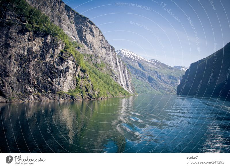 Geirangerfjord Cloudless sky Beautiful weather Mountain Waves Coast Fjord Blue Green Vacation & Travel Waterway Colour photo Exterior shot Deserted