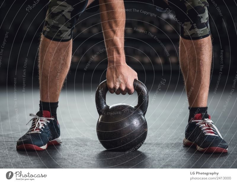 Man Kettle bell workout Lifestyle Club Disco Sports Human being Adults Clothing Fitness Authentic Strong Gray Power Determination Practice healthy Body building