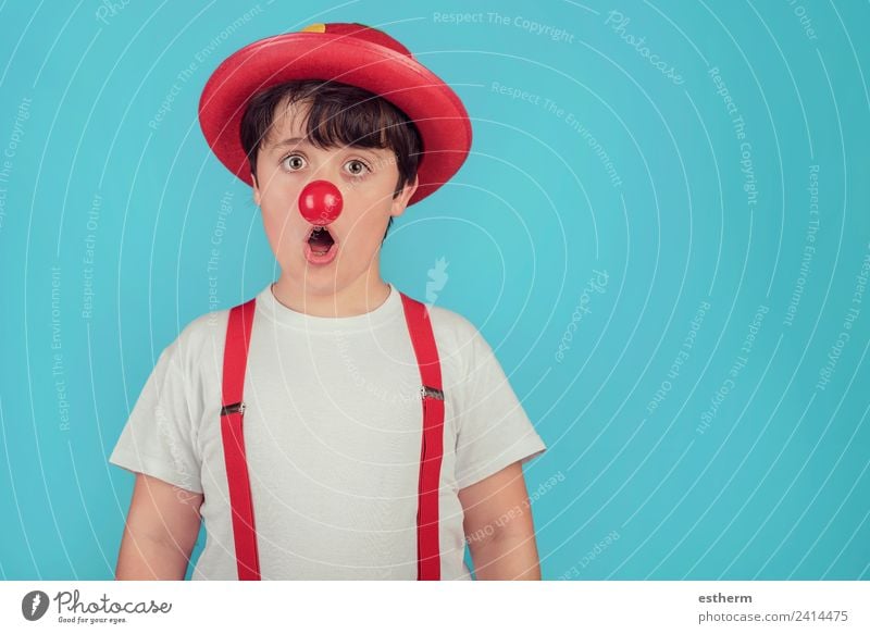 funny child with clown nose on blue background Lifestyle Joy Feasts & Celebrations Carnival Hallowe'en Fairs & Carnivals Birthday Human being Masculine Child
