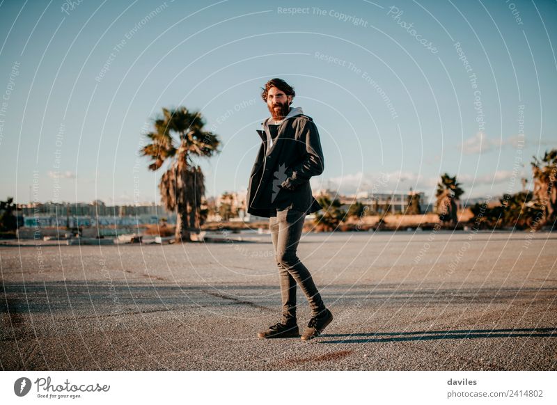 Portrait of bearded man walking in the street. Lifestyle Human being Masculine Young man Youth (Young adults) 1 18 - 30 years Adults Youth culture Subculture