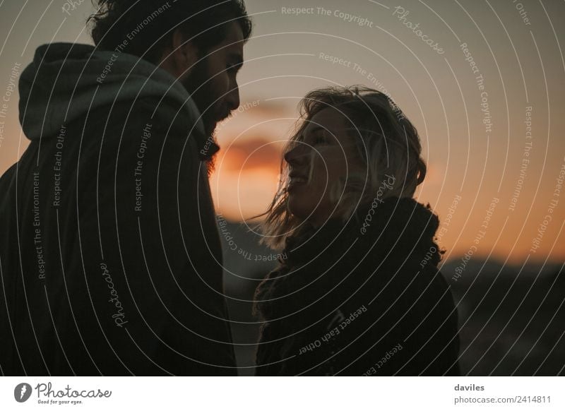 Bearded man and blonde woman looking to each other with tenderness at dusk. Lifestyle Human being Young woman Youth (Young adults) Young man Couple 2