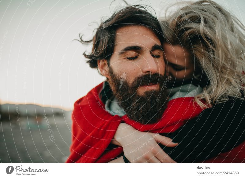 Close up of bearded man and blonde woman hugging outdoors Lifestyle Joy Summer Beach Ocean Winter Human being Young woman Youth (Young adults) Woman Adults Man