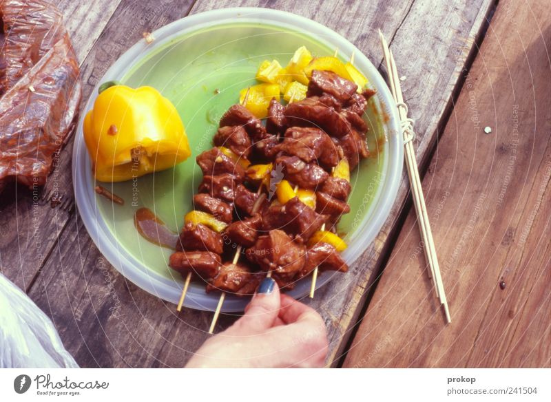 daintily Food Meat Vegetable Human being Woman Adults Hand To hold on Barbecue (event) Kebab Table Wood Rustic Delicious Sauce Spicy Colour photo Exterior shot