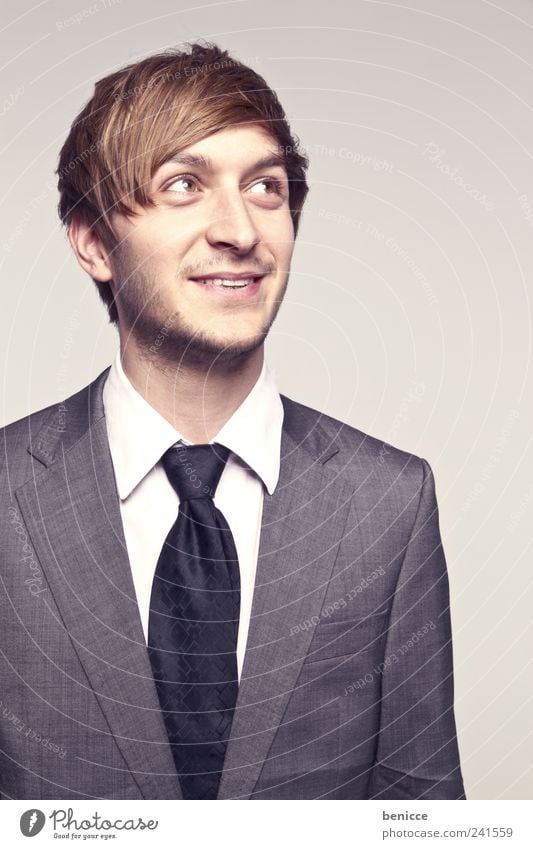 shyguy Man Human being Businesspeople Portrait photograph Laughter Smiling Looking Sideways To one side Tie Suit Isolated Image Reliability Timidity Joy Success