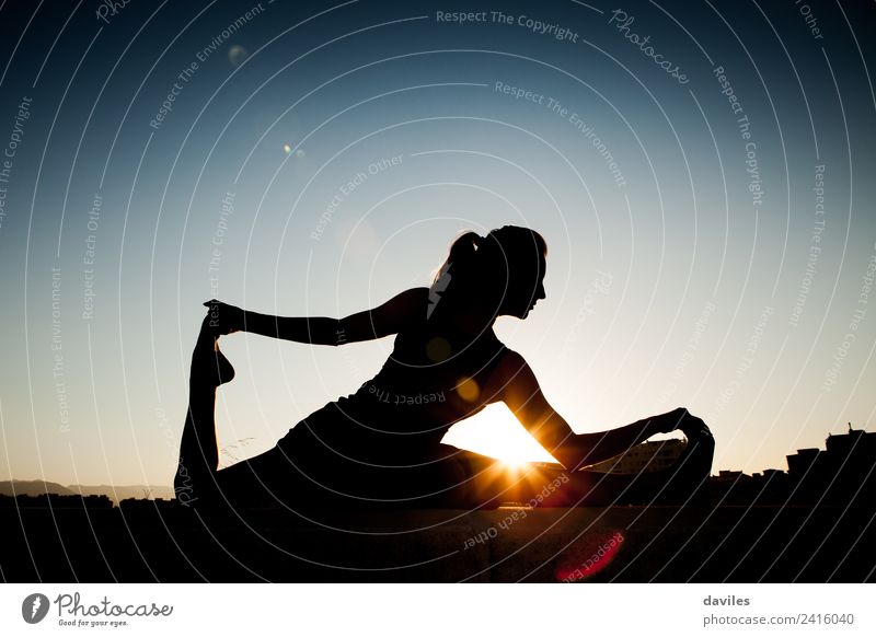 Woman silhouette stretching and doing yoga exercises Lifestyle Elegant Body Health care Athletic Wellness Relaxation Meditation Leisure and hobbies Summer Sun