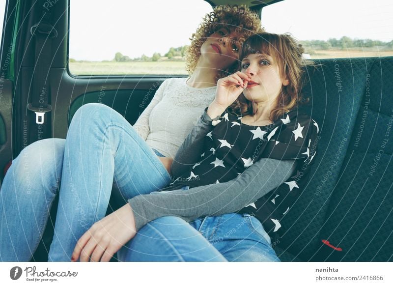 Two young friends together sitting inside a car Lifestyle Style Vacation & Travel Tourism Trip Adventure Human being Feminine Young woman Youth (Young adults)