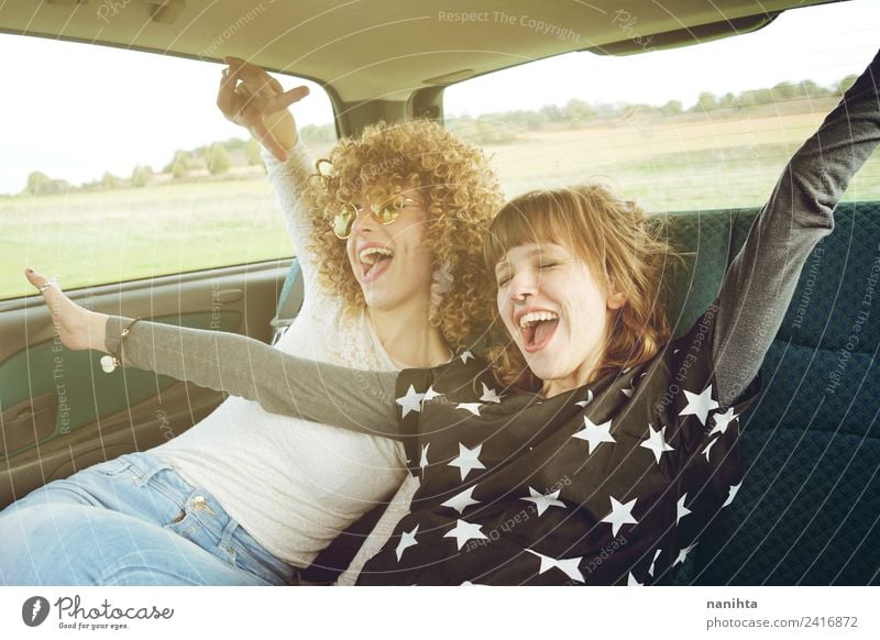 Two cheerful friends in a road trip Lifestyle Style Joy Wellness Vacation & Travel Tourism Trip Adventure Freedom Human being Feminine Young woman