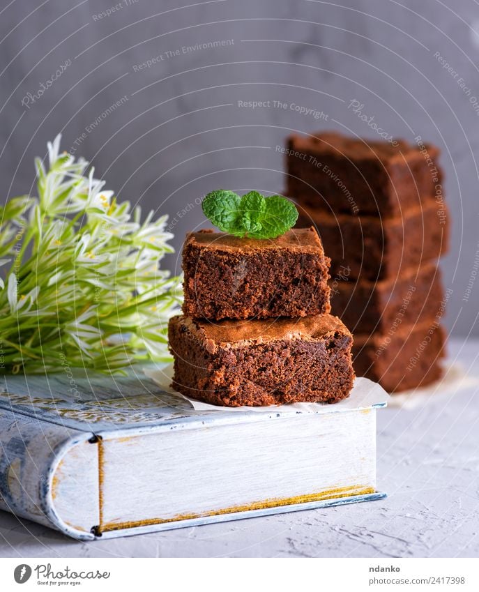 square pieces of chocolate brownie Dessert Candy Eating Table Flower Dark Delicious Brown White brownies cake food Sugar Slice background sweet cookie Bakery