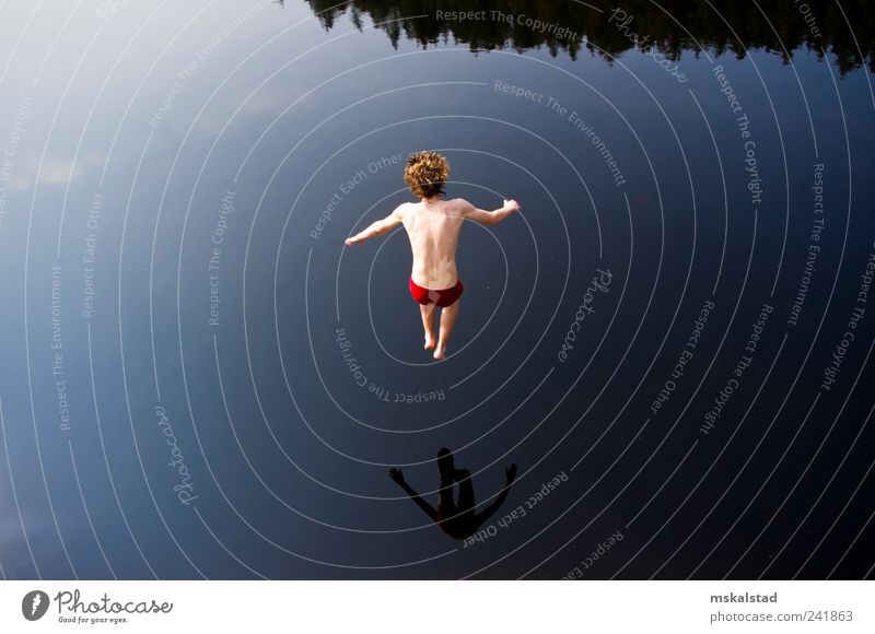 Jumping for it Human being Boy (child) Youth (Young adults) Life Skin Nature Swimming & Bathing Cool (slang) Thin Blue Pond Clouds Tree Boxer Reflection
